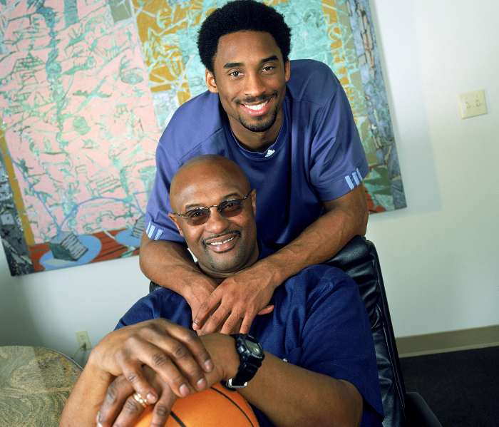 Kobe Bryant smiling with his father, Joe Bryant