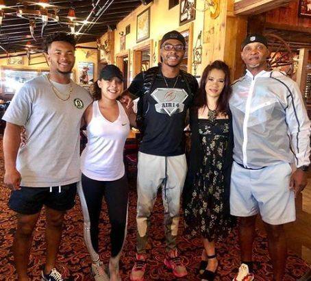 Kyler Murray with his parents and half siblings