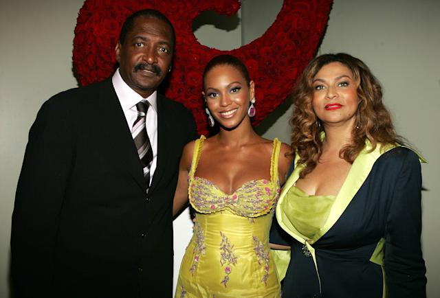 Image of Beyonce with her parents, Matthew and Tina Knowles