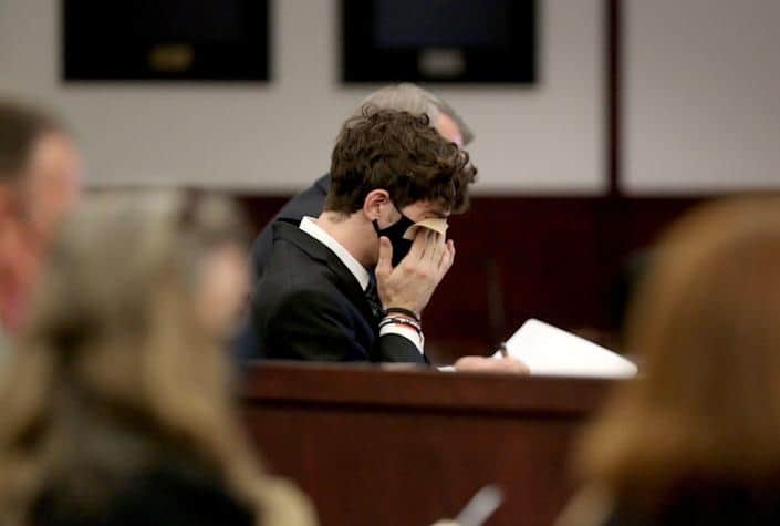 Image of Cameron Herrin being emotional in his court trial 