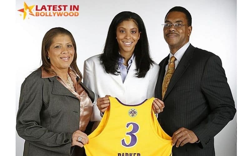 Image of Candice Parker with her parents 