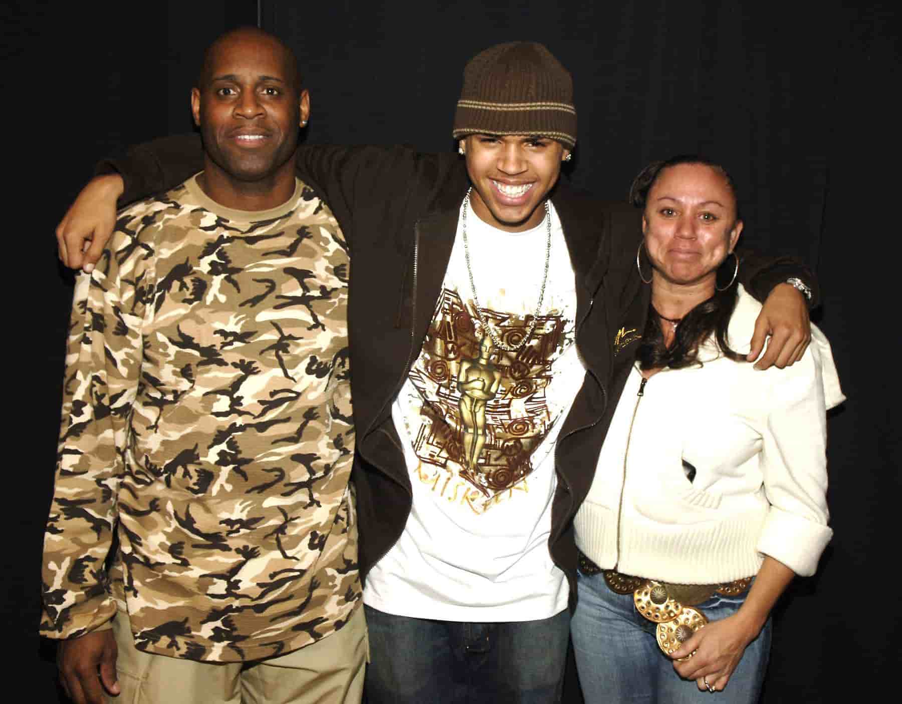 Image of Chris Brown with his parents Joyce Hawkins and Clinton Brown