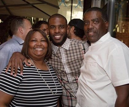 Image of Chris Paul with his parents, Charles and Robin Paul