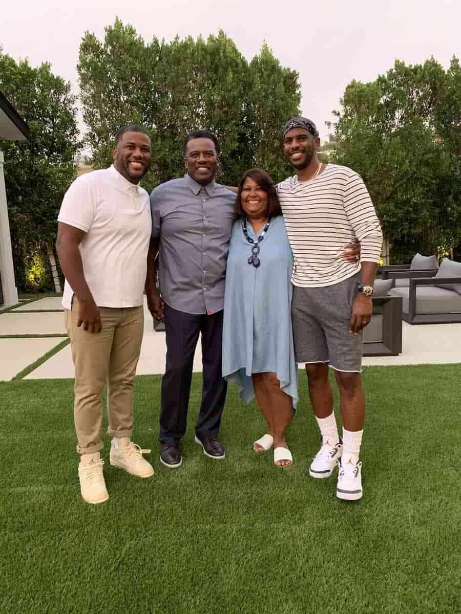 Image of Chris Paul with his parents, Charles and Robin Paul, and brother, CJ Paul