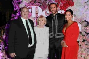 Image of Colin Kaepernick with his parents 
