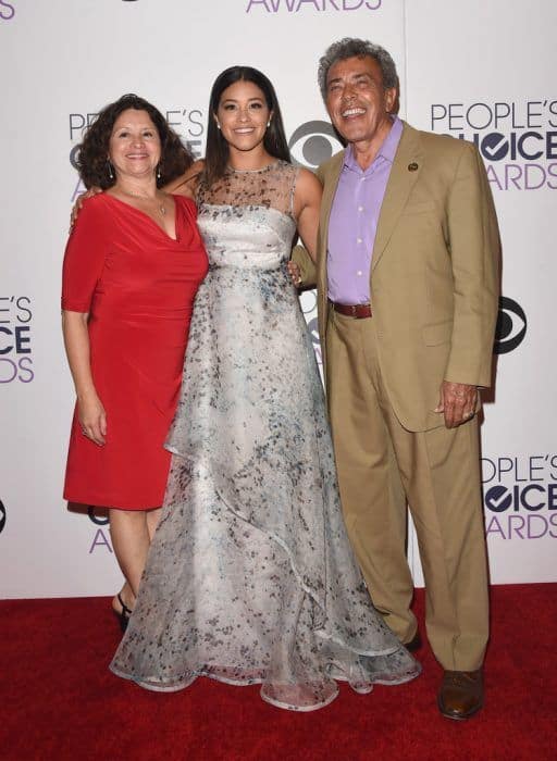 Image of Gina Rodriguez with her parents, Gino and Magali Rodriguez