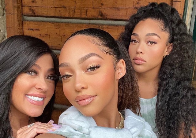 Image of Jordyn Woods with her sister and mother, Elizabeth Woods