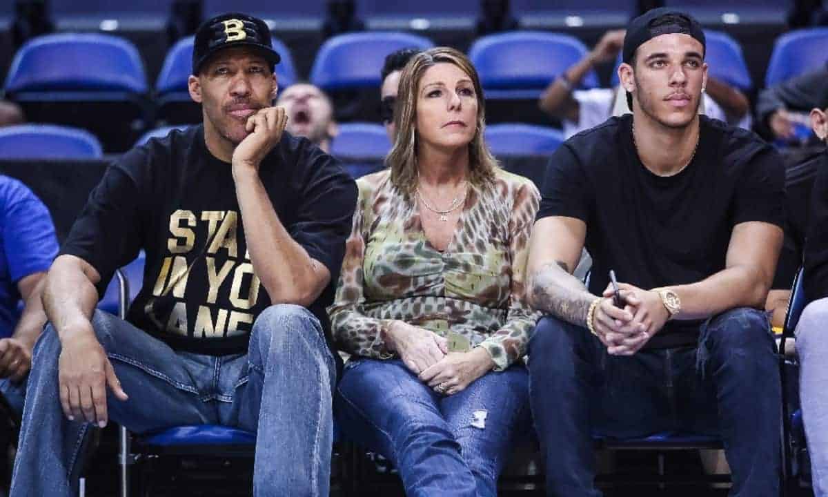 Image of Lonzo Ball with his parents, Tina and LaVar Ball