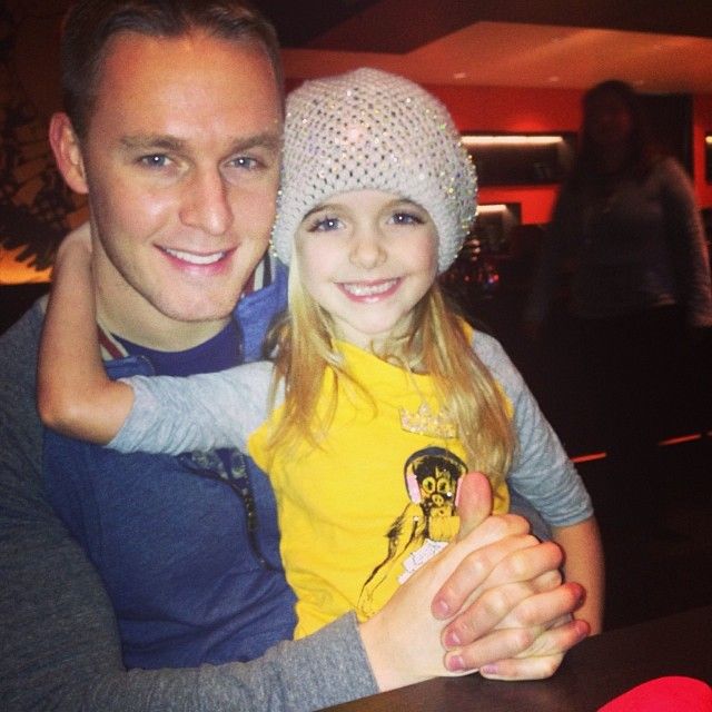Image of McKenna Grace with her father, Ross Burge