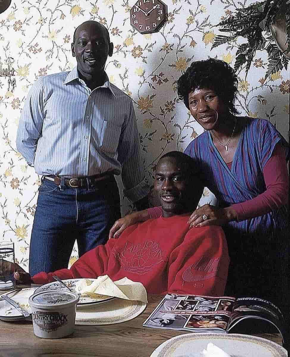 Image of Michael Jordan with his parents, Deloris Peoples Jordan and James Raymond Jordan, Sr. 