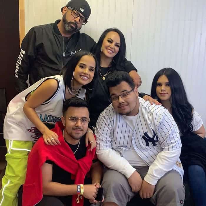 Image of Becky G with her family