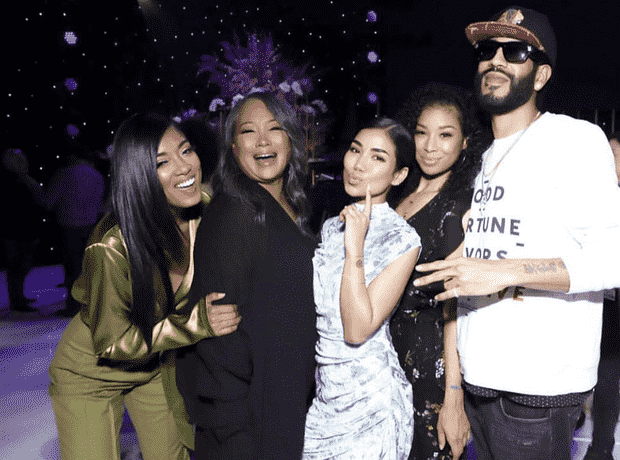 Image of Jhene Aiko with her mother and siblings