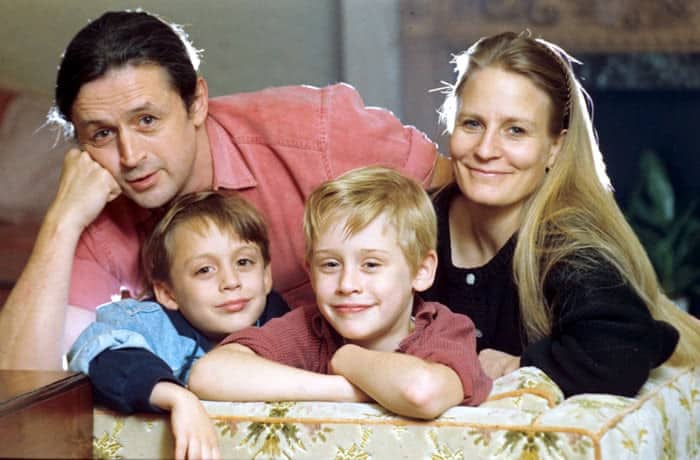 Image of Macaulay Culkin with his parents