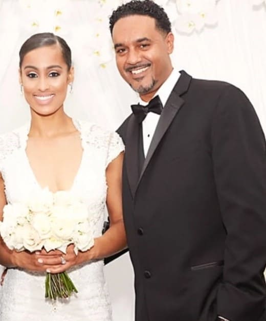 Image of Skylar Diggins Smith with her father, Tige Diggins