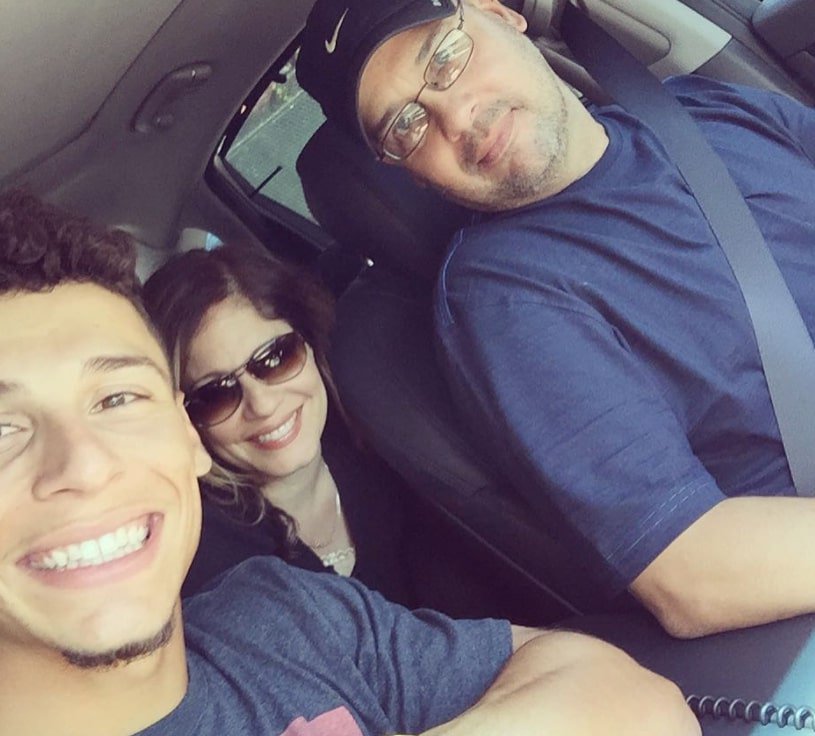 Image of Andrew Velazquez with his parents, Kenneth and Margaret Velazquez