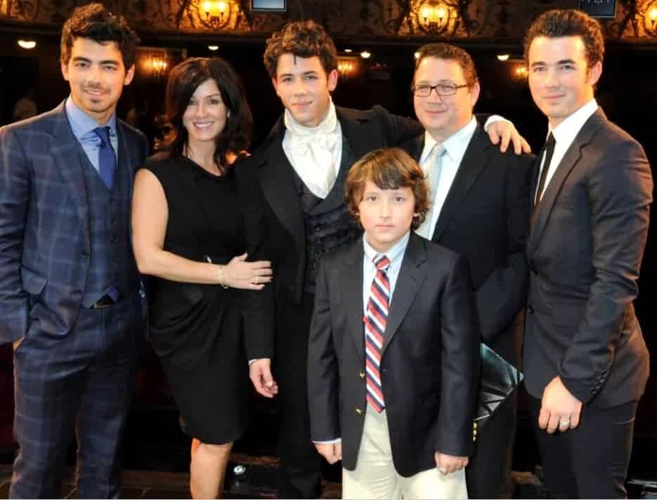 Image of Nick Jonas with his family