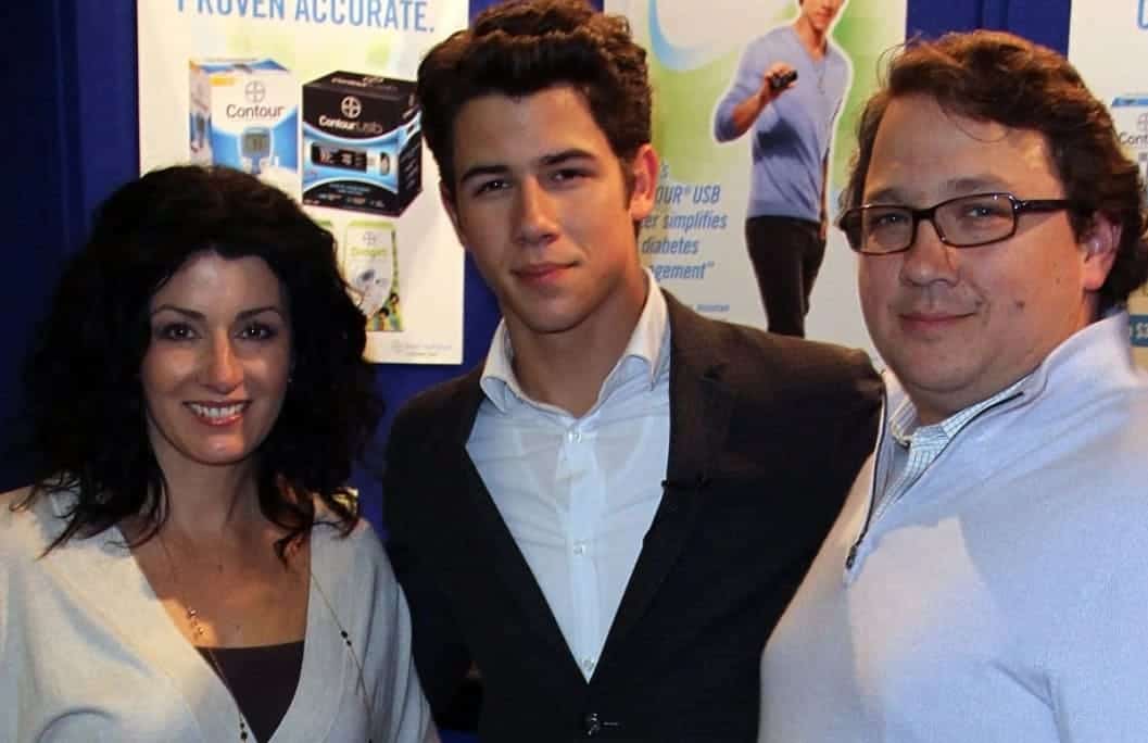Image of Nick Jonas with his parents, Denise-Miller-Jonas and Paul Kevin Jonas Sr.