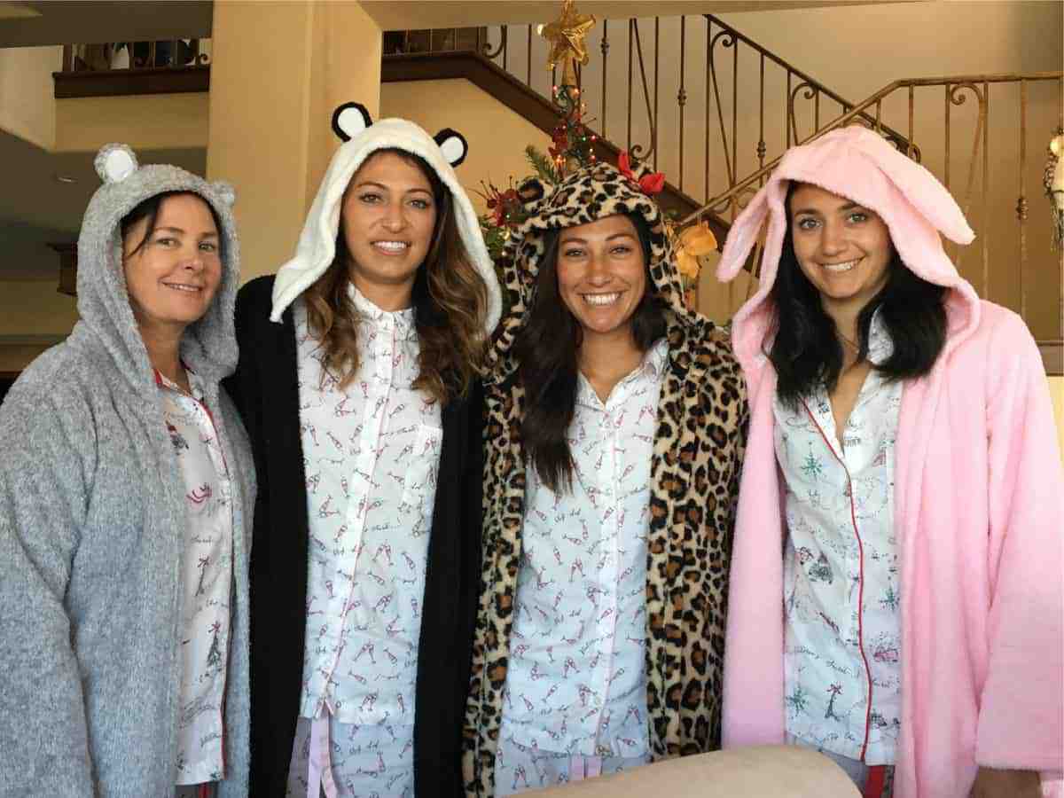 Image of Christen Press with her mother, Stacy Press, and her sisters